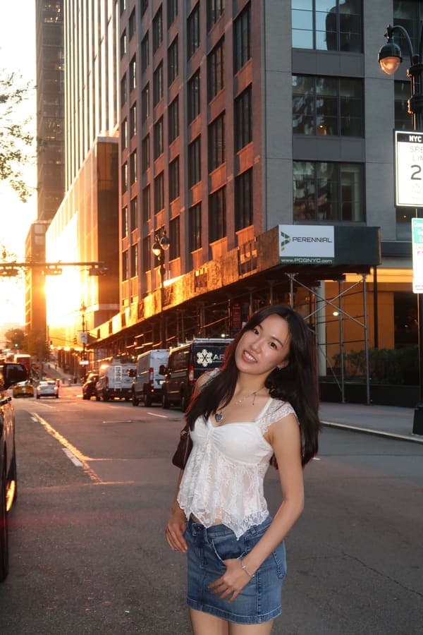 Mandy on a New York street at golden hour